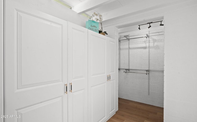 5809 N 10th Pl, Phoenix, AZ 85014 - walk in closet with beam ceiling and wood finished floors