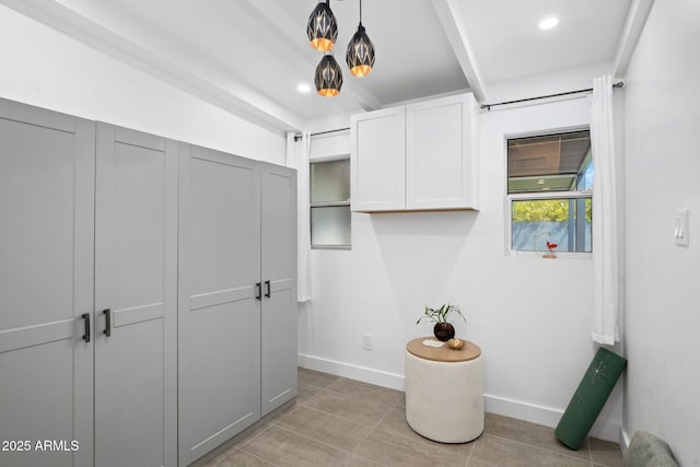 5809 N 10th Pl, Phoenix, AZ 85014 - washroom featuring light tile patterned flooring, baseboards, and recessed lighting