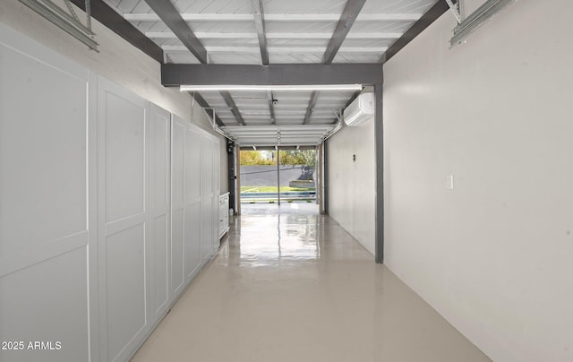 5809 N 10th Pl, Phoenix, AZ 85014 - hall featuring an AC wall unit, finished concrete floors, and lofted ceiling with beams