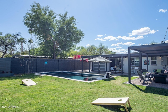 5809 N 10th Pl, Phoenix, AZ 85014 - view of yard featuring a patio, a fenced backyard, a fenced in pool, and a fire pit