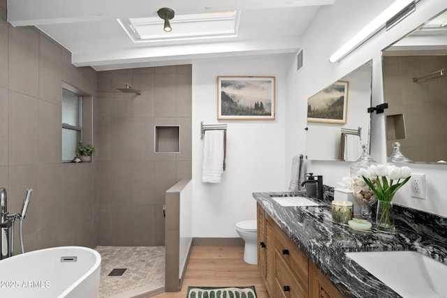 5809 N 10th Pl, Phoenix, AZ 85014 - full bathroom with a walk in shower, wood finished floors, a sink, and visible vents