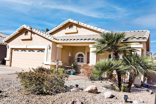 view of front of home with a garage