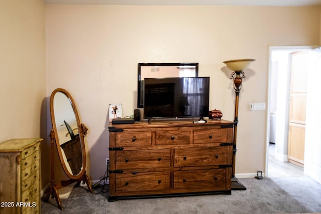 bedroom featuring light colored carpet