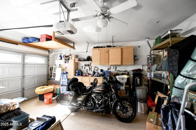 garage with ceiling fan and a garage door opener