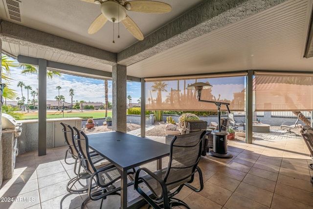 view of patio / terrace featuring ceiling fan