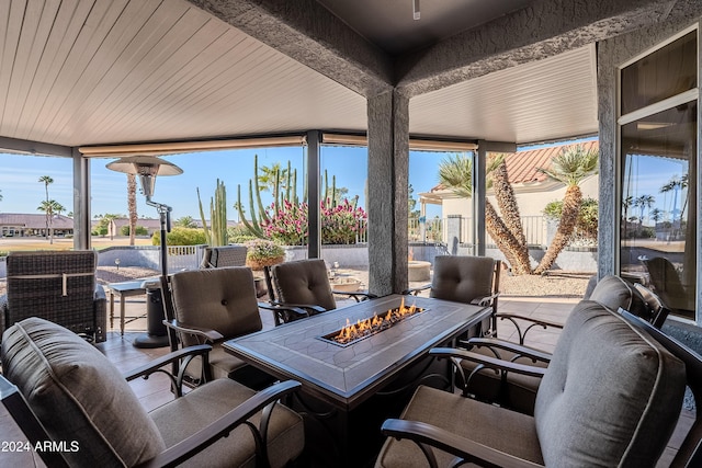 view of patio / terrace featuring an outdoor fire pit