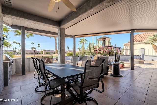 view of patio with ceiling fan