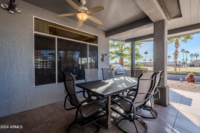 view of patio / terrace with area for grilling and ceiling fan