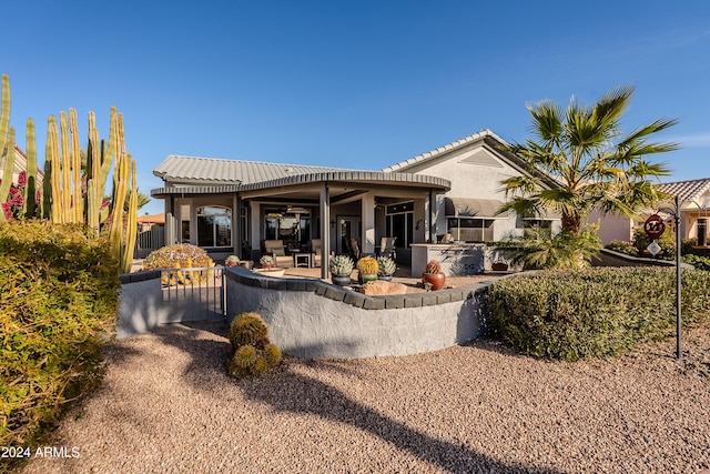 rear view of house with a patio area