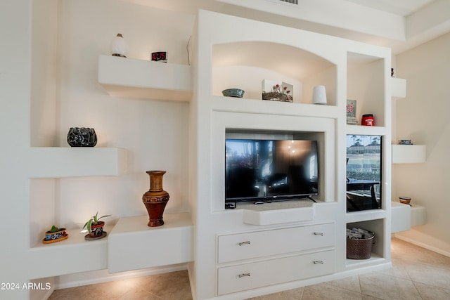 tiled living room with built in features