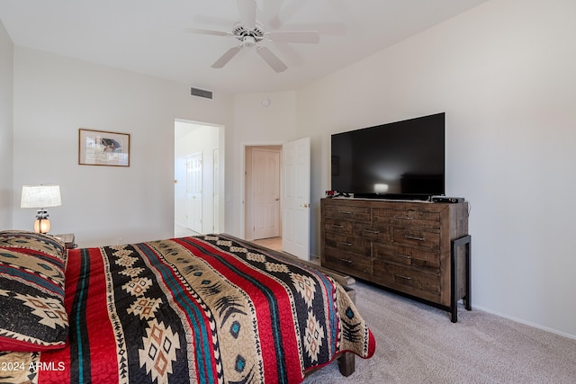 bedroom with light colored carpet and ceiling fan