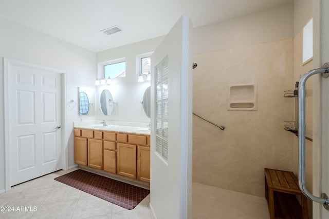 bathroom featuring tile patterned floors and vanity