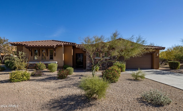 view of front of house with a garage