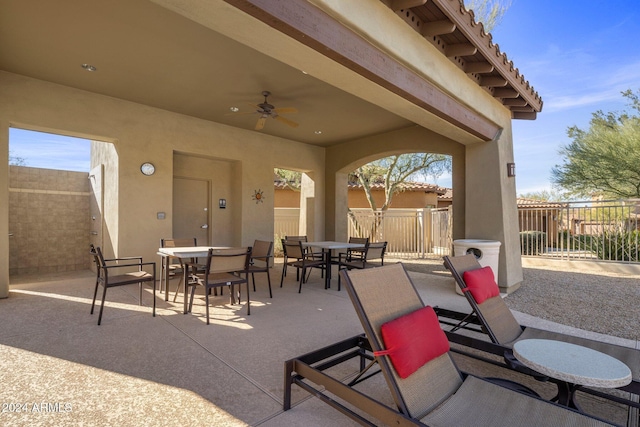 view of patio featuring ceiling fan