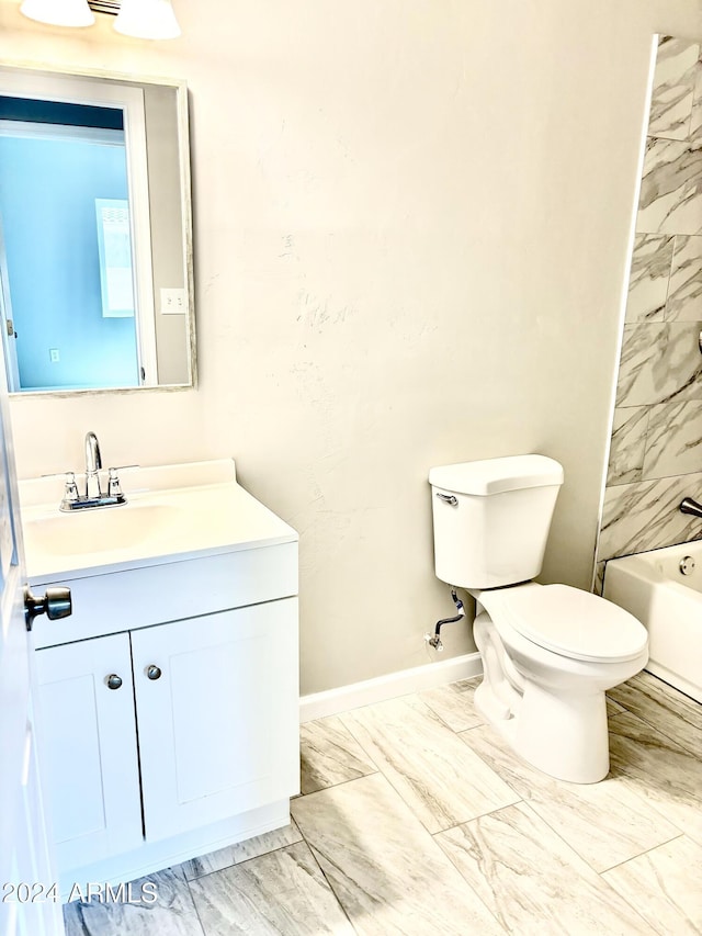 full bathroom featuring vanity, toilet, and tiled shower / bath combo