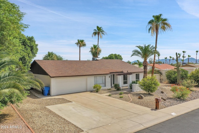 ranch-style home with a garage