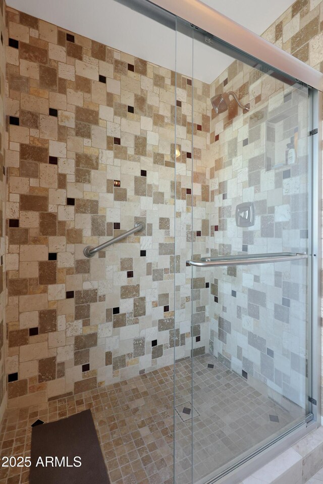 full bathroom with a stall shower