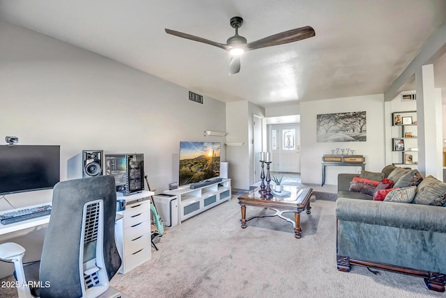 living room with light colored carpet and ceiling fan