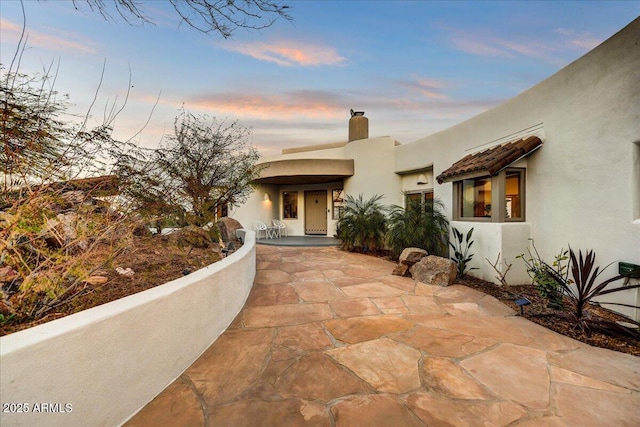 view of front of property featuring stucco siding