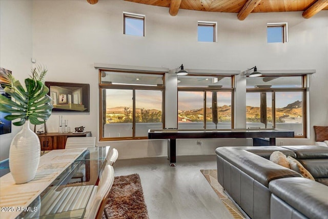 interior space featuring wood ceiling and beam ceiling