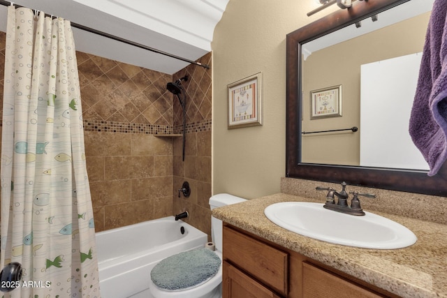 full bath featuring shower / bath combo with shower curtain, vanity, and toilet