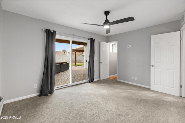 unfurnished room with carpet floors and ceiling fan