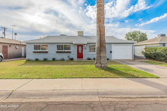 ranch-style home with a front yard and a garage