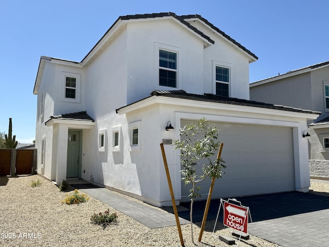 1552 N Pueblo Dr, Apache Junction, AZ 85120 - view of front of home featuring stucco siding, driveway, and a tile roof