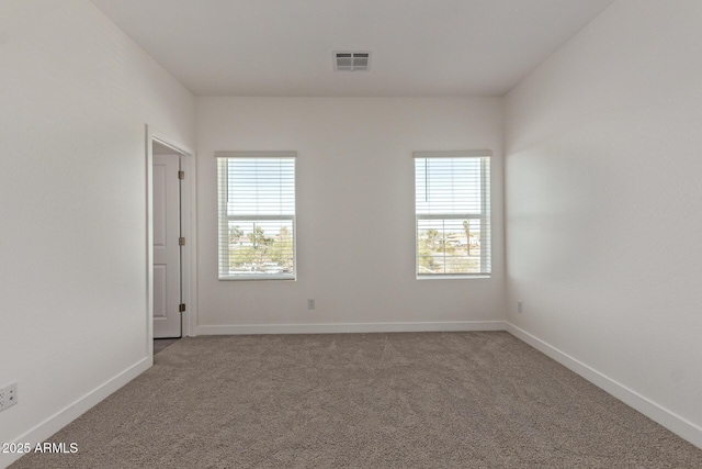 1552 N Pueblo Dr, Apache Junction, AZ 85120 - carpeted spare room featuring baseboards