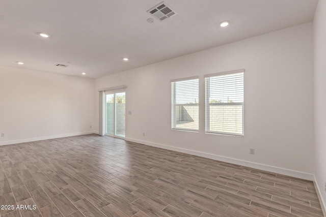 1552 N Pueblo Dr, Apache Junction, AZ 85120 - empty room with wood finished floors and recessed lighting