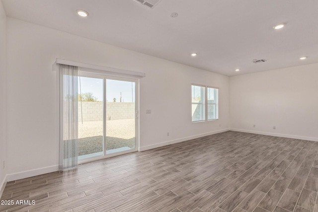 1552 N Pueblo Dr, Apache Junction, AZ 85120 - unfurnished room with wood finished floors and recessed lighting