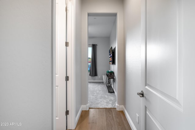 corridor featuring light wood-type flooring