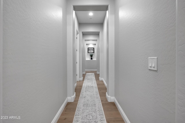 hall featuring light wood-type flooring