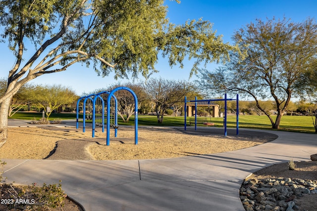 view of jungle gym featuring a yard