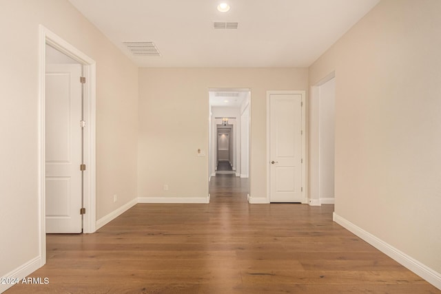 empty room featuring hardwood / wood-style floors