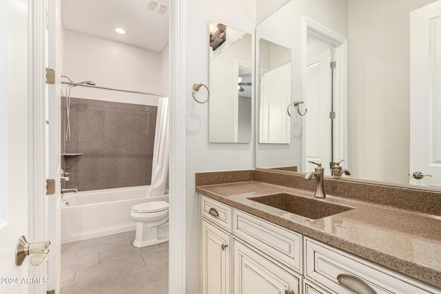 full bathroom with toilet, tile patterned floors, vanity, and shower / tub combo with curtain