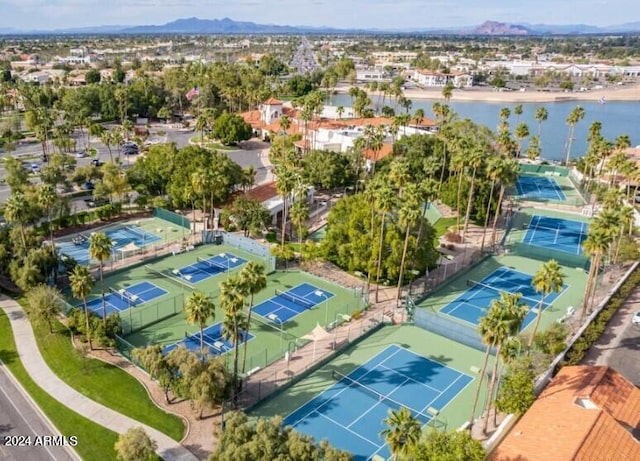 bird's eye view with a water and mountain view