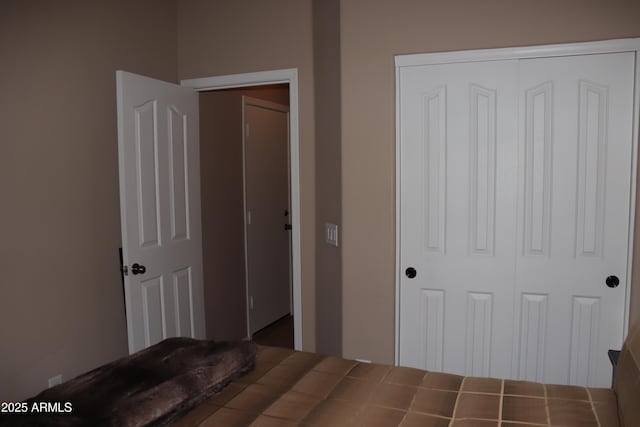 unfurnished bedroom featuring a closet