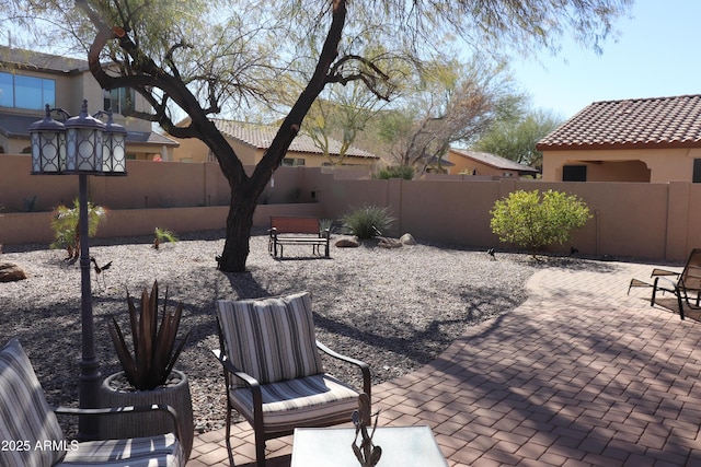 view of patio / terrace featuring a fenced backyard