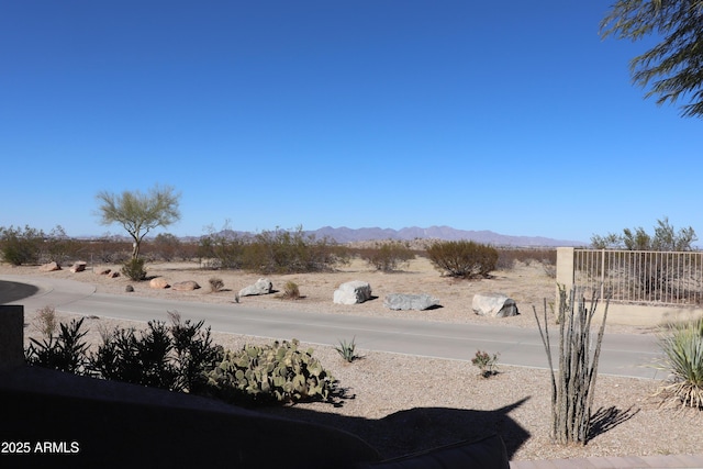 view of yard with a mountain view