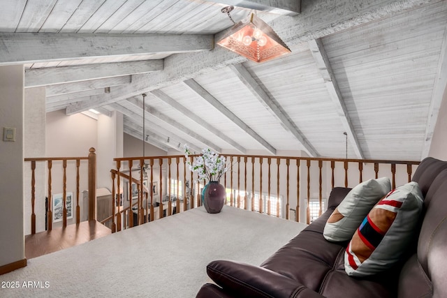 living room featuring lofted ceiling with beams