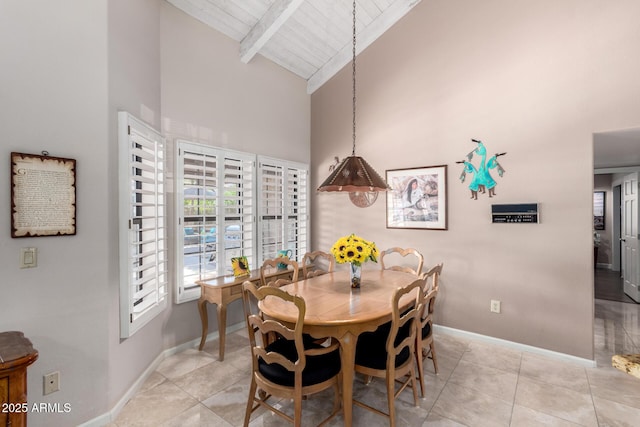 dining room with baseboards, high vaulted ceiling, beam ceiling, light tile patterned flooring, and wood ceiling