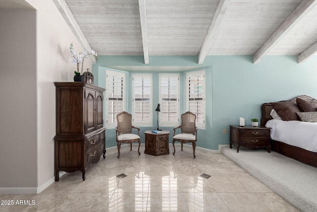 bedroom with light tile patterned flooring, wooden ceiling, vaulted ceiling with beams, and baseboards