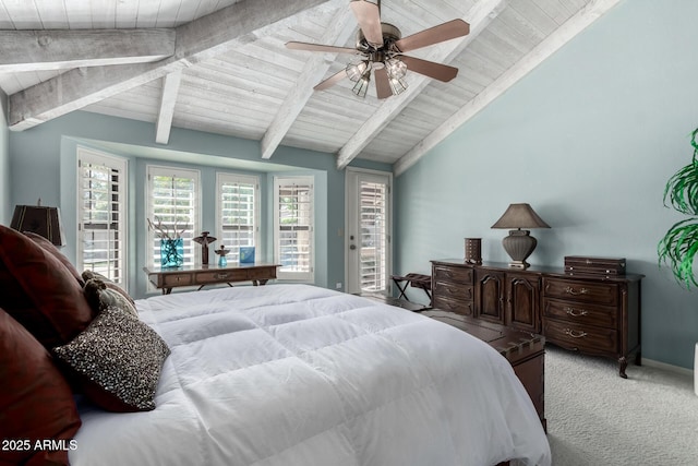 bedroom featuring a ceiling fan, carpet, baseboards, vaulted ceiling with beams, and wood ceiling