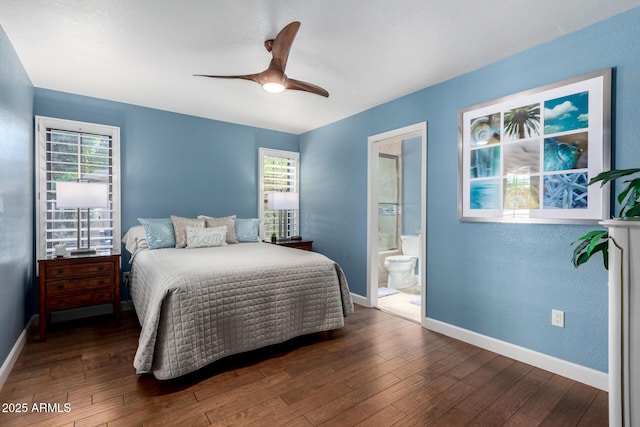 bedroom with multiple windows, baseboards, and hardwood / wood-style floors