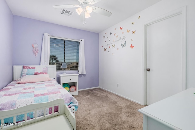 carpeted bedroom featuring visible vents, ceiling fan, and baseboards