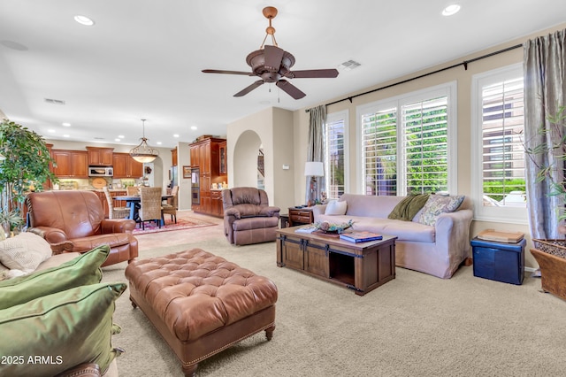 2383 E Zion Way, Chandler, AZ 85249 - living area with recessed lighting, light colored carpet, arched walkways, and ceiling fan
