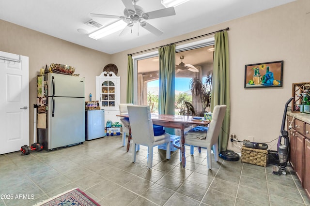 2383 E Zion Way, Chandler, AZ 85249 - dining room with ceiling fan and light tile patterned flooring