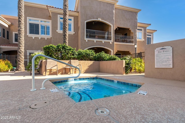 8245 E Bell Rd Unit 133, Scottsdale, AZ 85260 - view of swimming pool featuring fence