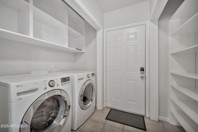 8245 E Bell Rd Unit 133, Scottsdale, AZ 85260 - laundry area featuring separate washer and dryer, laundry area, and light tile patterned flooring